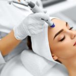 Young Female Getting Hydrafacial treatment in Noble Clinic in Draper, Utah